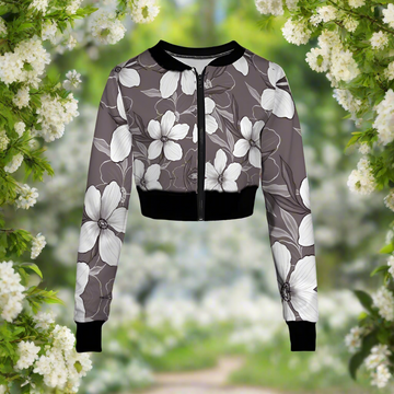 The Whitte Blossoms Women's Full Zipper Crop Jacket is a standout piece in women's fashion, featuring a stylish black-and-white floral design on a gray background. Complete with black collar, cuffs, and hem, it combines both functionality and flair with its zipper closure down the front.