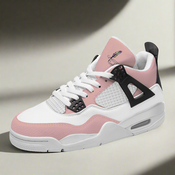 The Blush Breezel Fashion Sneakers showcase a chic white and pink color scheme, complemented by a white padded tongue, black lace eyelets, white soles, and an eye-catching visible air unit in the sole that provides exceptional shock absorption.