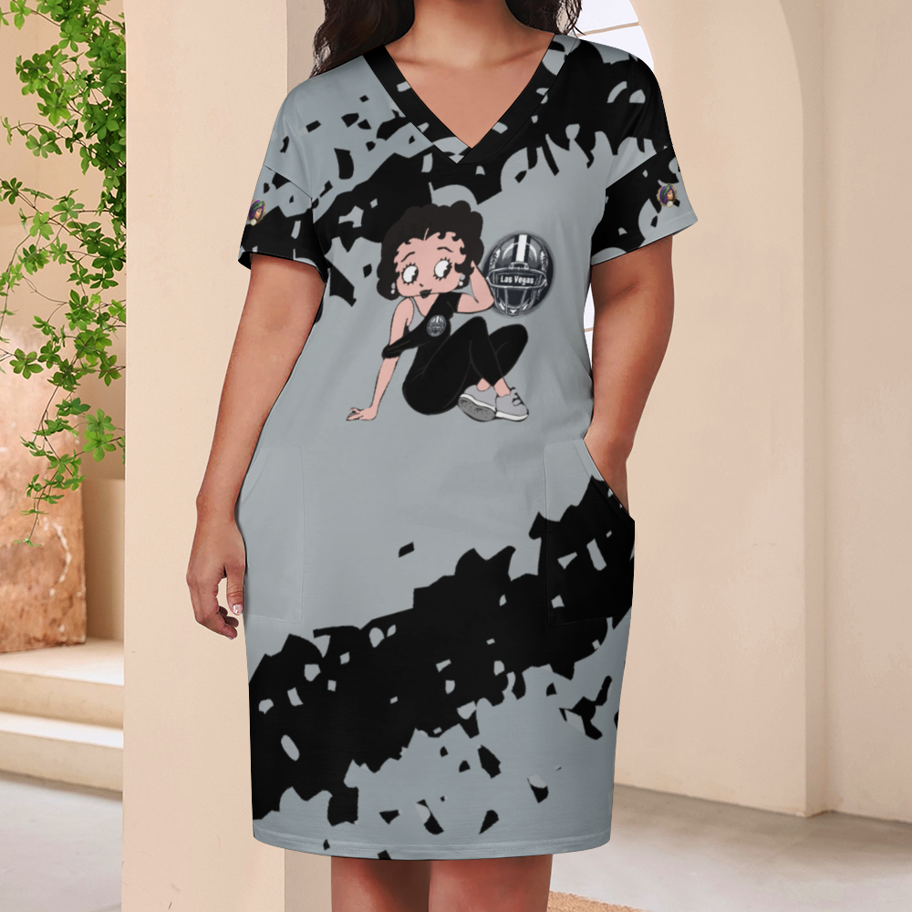 A person wearing the Las Vegas Mouth Women's V-neck Loose Dress with Pockets in gray and black splatter, featuring a cartoon character graphic on the front. The person accessorizes with a choker necklace and a watch, achieving a chic casual look.